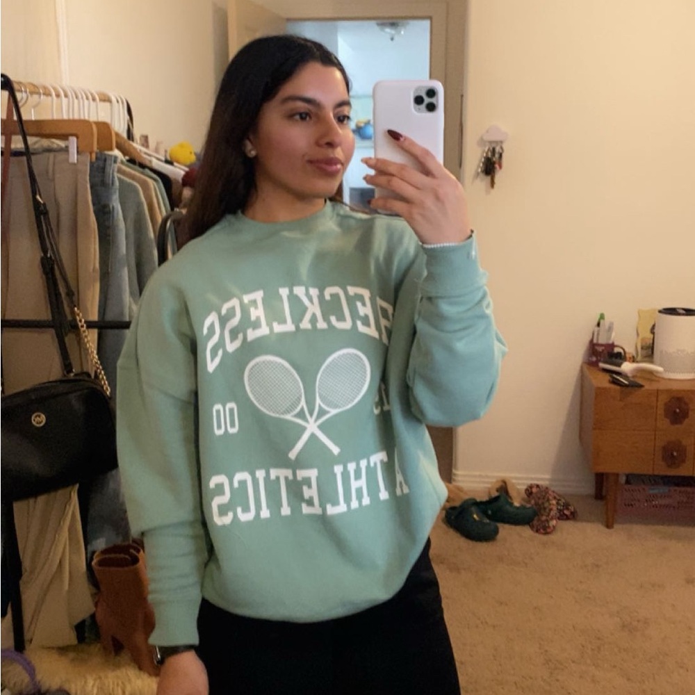 Young and Reckless Sweater